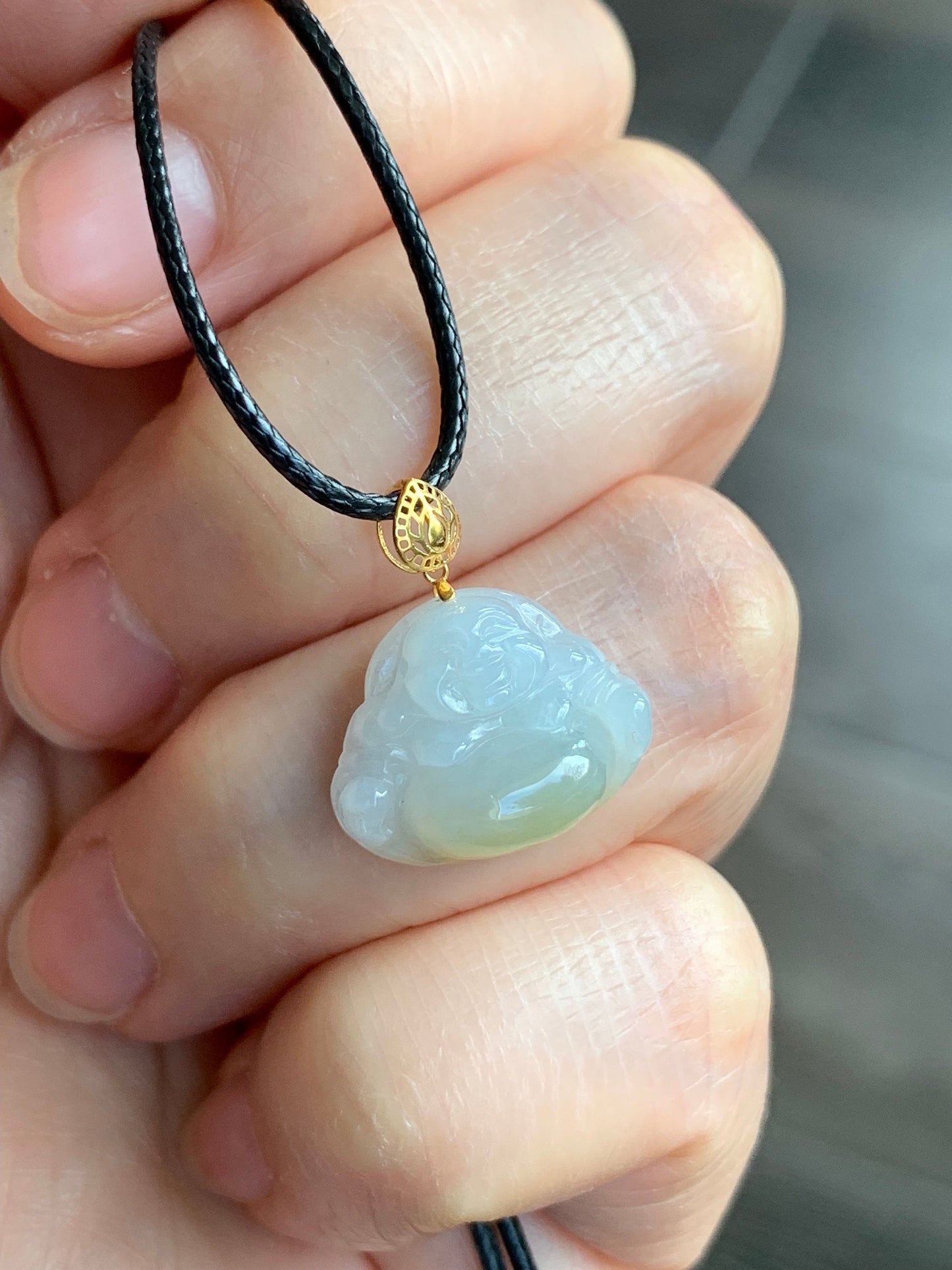 Petite Natural Burmese Icy Translucent Gelatinous Jadeite with yellow marbling Buddha Pendant 18K Yellow Bail w/ 17” Cord 天然缅甸冰飘黄翡翠佛公镶嵌吊坠