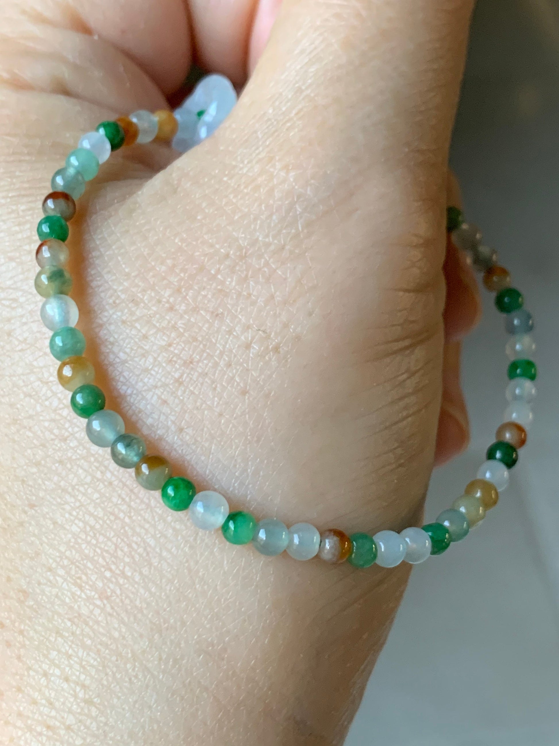 Natural Burmese Icy Translucent Multi-Colored Jadeite Petite Beads w/ Flower Sliding Jadeite Ring Beaded Bracelet 6.75” 天然缅甸冰多宝翡翠小圆珠白冰跑环手串