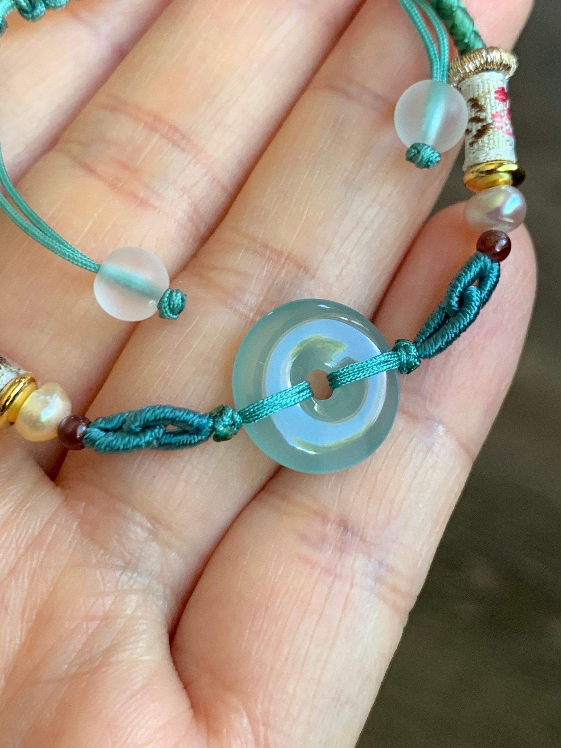 Natural Burmese Icy Highly Translucent Light Green Jadeite Ping An Kou Donut Bead Rope Bracelet Adjustable up to 8.5” 天然缅甸冰胶晴底翡翠平安扣手绳