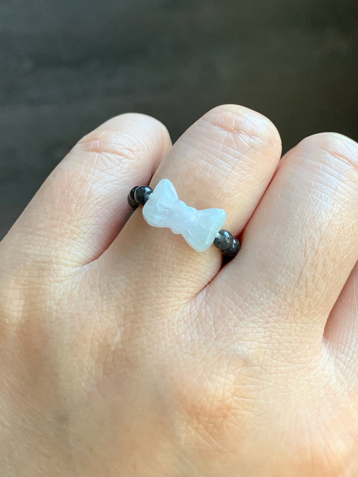 Natural Burmese Icy Translucent Gelatinous White Jadeite Bow Dark Wuji Jadeite Petite Beads Beaded Ring Stretchy 天然缅甸白冰起光翡翠蝴蝶结乌鸡翡翠戒圈