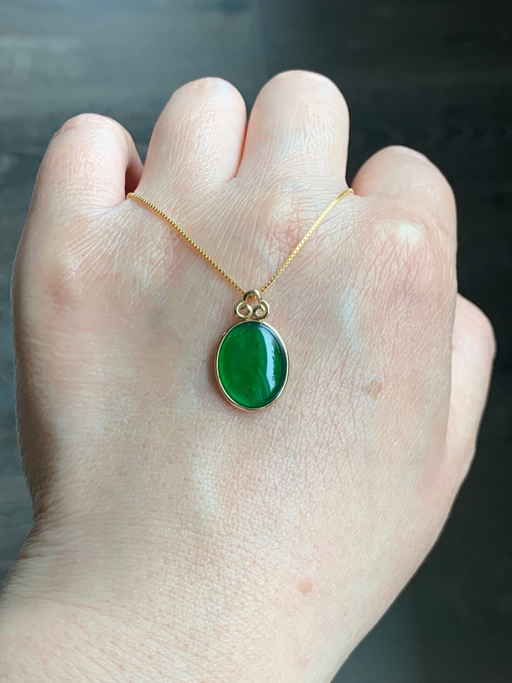 Certified Natural Guatemalan Icy Highly Translucent Vibrant Green Jadeite Oval Pendant 18K Yellow Gold Ruyi Design 天然老种冰危绿翡翠如意款镶嵌吊坠 1455