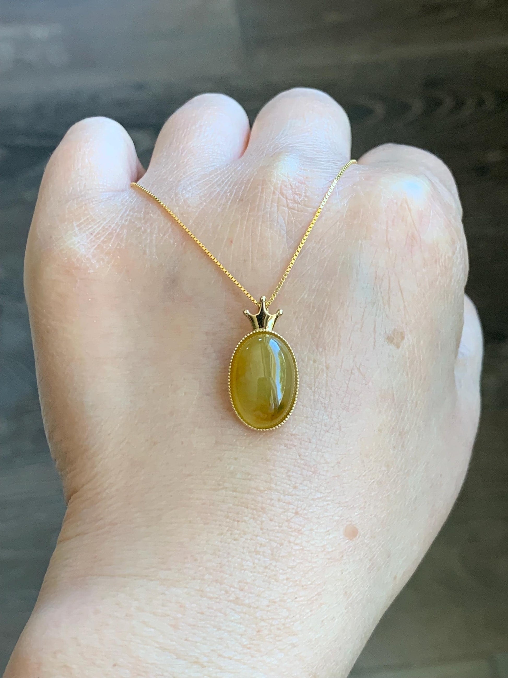 Certified Natural Burmese Icy Translucent Intense Yellow Jadeite Oval Cabochon Pendant Crown Design 18K Yellow Gold 天然缅甸起冰油黄翡翠皇冠镶嵌吊坠 8627