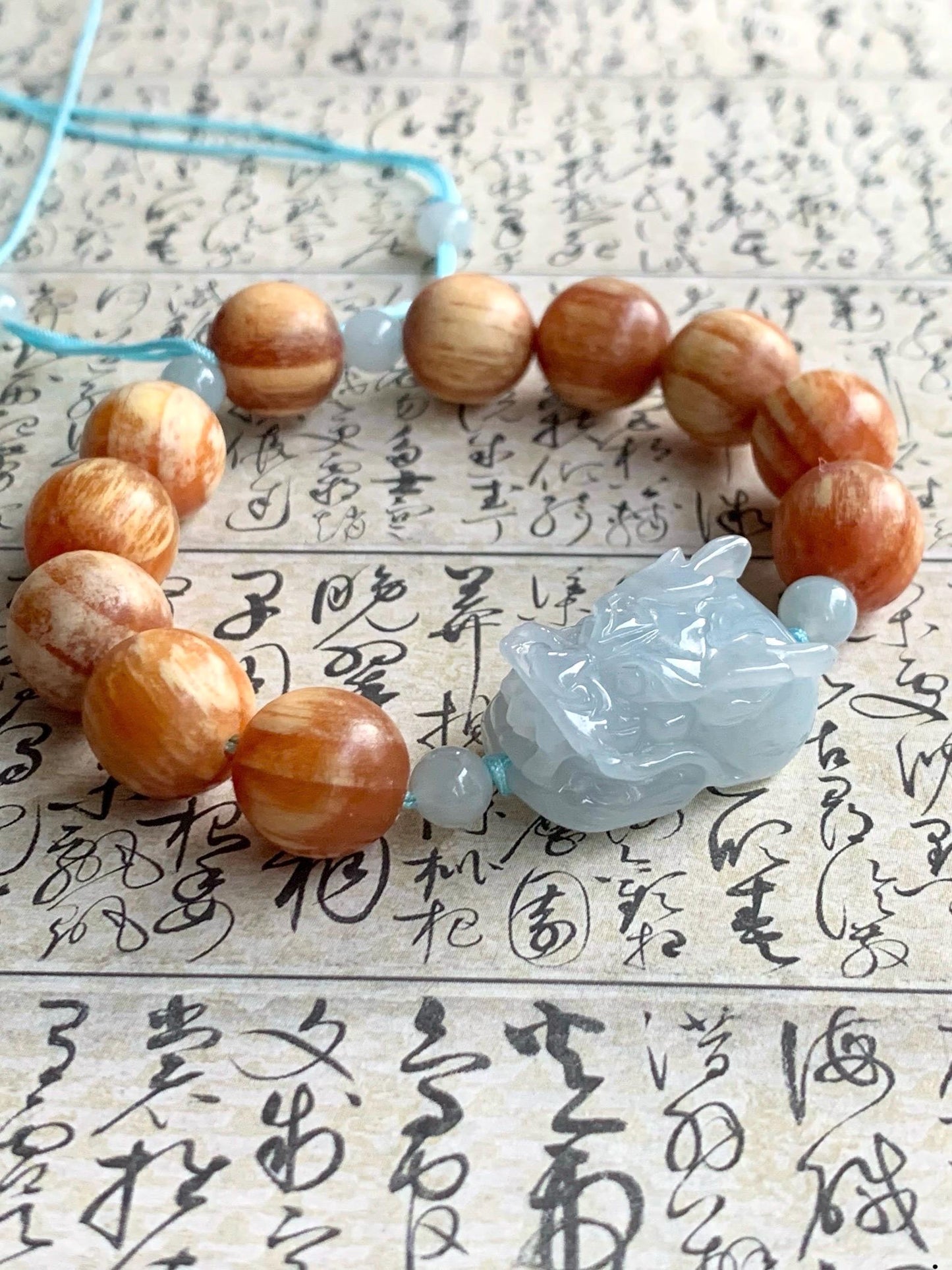 Natural Burmese Icy Translucent Gelatinous Light Blue Jadeite Dragon Head Fossilized Wood Beads Beaded Bracelet 12 mm 6.5” 天然缅甸冰淡蓝翡翠龙头琥珀木珠手串