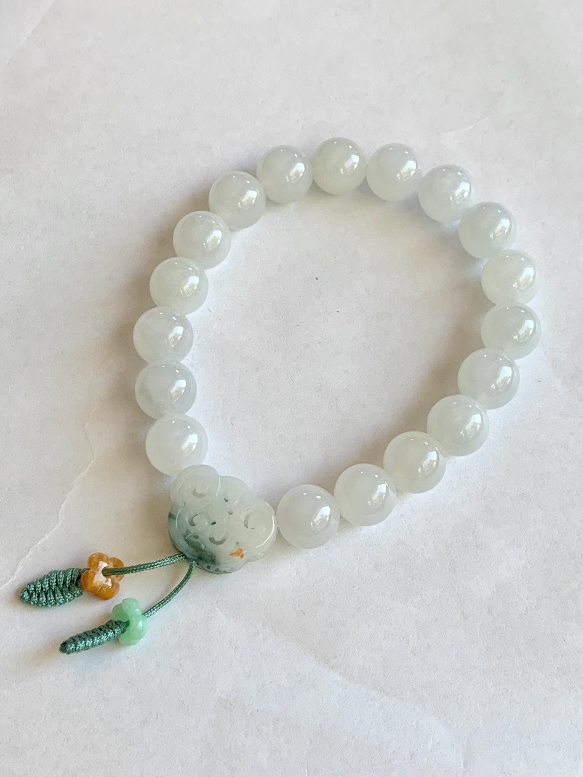 Natural Burmese Icy Translucent Gelatinous White Jadeite & Engraved Jadeite Ruyi Beaded Bracelet 10mm 7.25” 35g 天然缅甸白冰胶翡翠飘绿花镂空雕如意珠手串 DMB912