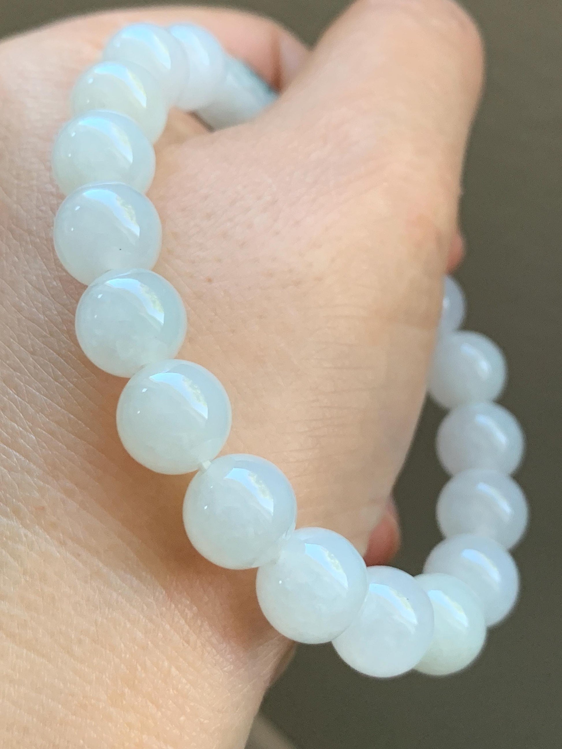 Natural Burmese Icy Translucent Gelatinous White Jadeite & Engraved Jadeite Ruyi Beaded Bracelet 10mm 7.25” 35g 天然缅甸白冰胶翡翠飘绿花镂空雕如意珠手串 DMB912