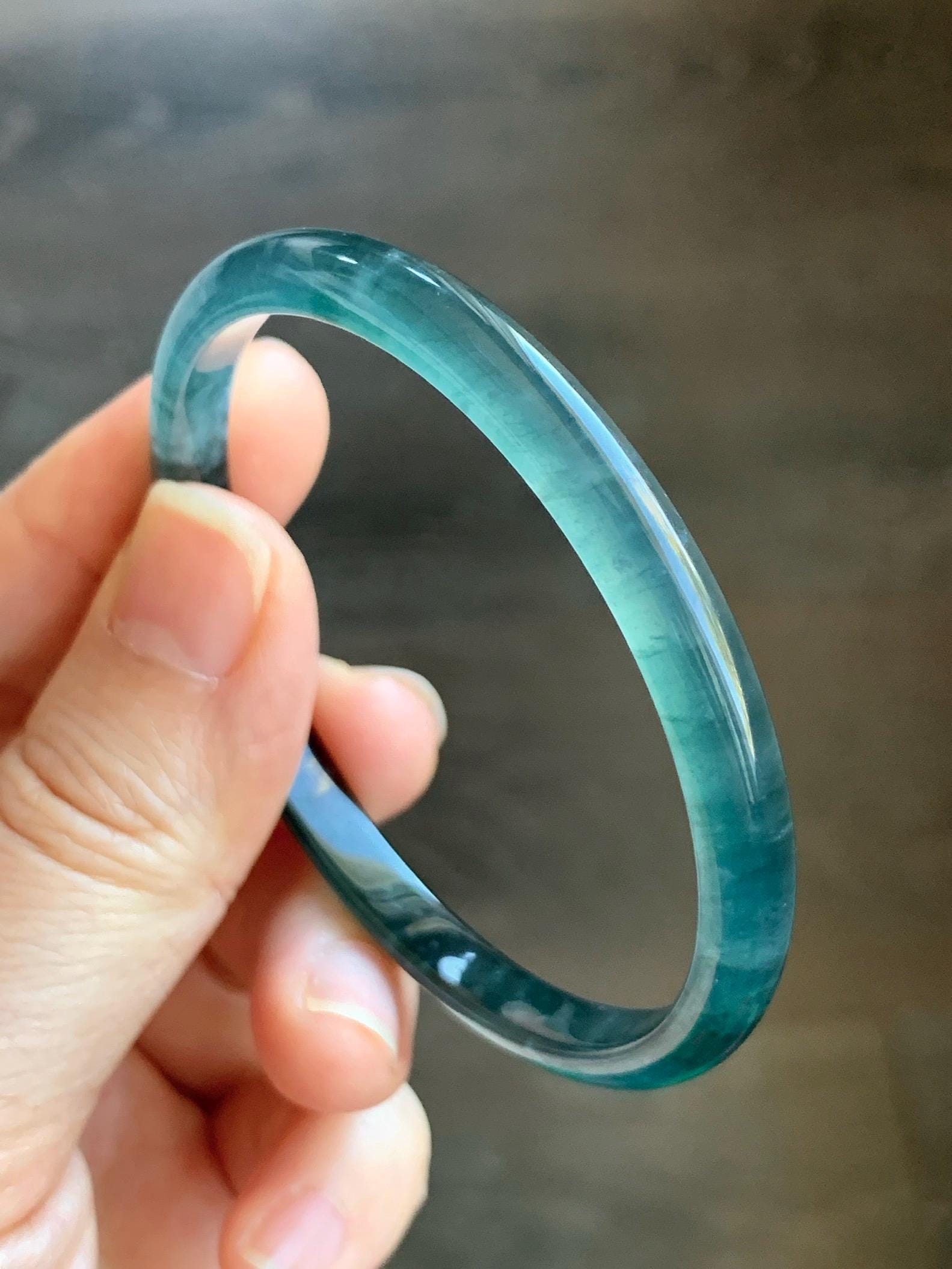 Certified Natural Guatemalan Icy Highly Translucent Gelatinous Dark Teal Blue Jadeite Slim Bangle 55.77mm 15.27g 天然老种冰胶危深蓝飘花翡翠细条手镯 1133